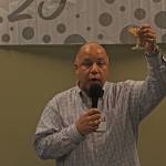 Randall Smith, Kent Downtown Partnership president and business owner, raises a glass to toast the organizations 25 years at the gala Thursday night. MARK KLAAS, Kent Reporter
