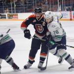 The Thunderbirds&rsquo; Nolan Volcan, right, and the Tigers&rsquo; Mark Rassell battle for position during WHL play Saturday. COURTESY PHOTO, Randy Feere