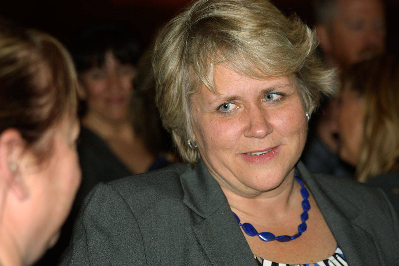 Dana Ralph mingles with supporters at her Kent mayoral campaign gathering at Airways Brewing Bistro on Tuesday night. Ralph was leading Jim Berrios after the first official tally on general election night. MARK KLAAS, Kent Reporter