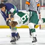 Thunderbirds defenseman Aaron Hyman scuffles with Silvertips right winger Dawson Butt during WHL play at the accesso ShoWare Center on Saturday night. COURTESY PHOTO, Brian Liesse, T-Birds