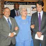 Kent Mayor Suzette Cooke recognizes outgoing City Council members Jim Berrios, left, and Dennis Higgins, right, as Council President Bill Boyce looks on from the background. STEVE HUNTER, Kent Reporter