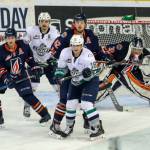 Kamloops goalie Dylan Ferguson draws a crowd in front of the net during WHL play Wednesday night. COURTESY PHOTO, Allen Douglas