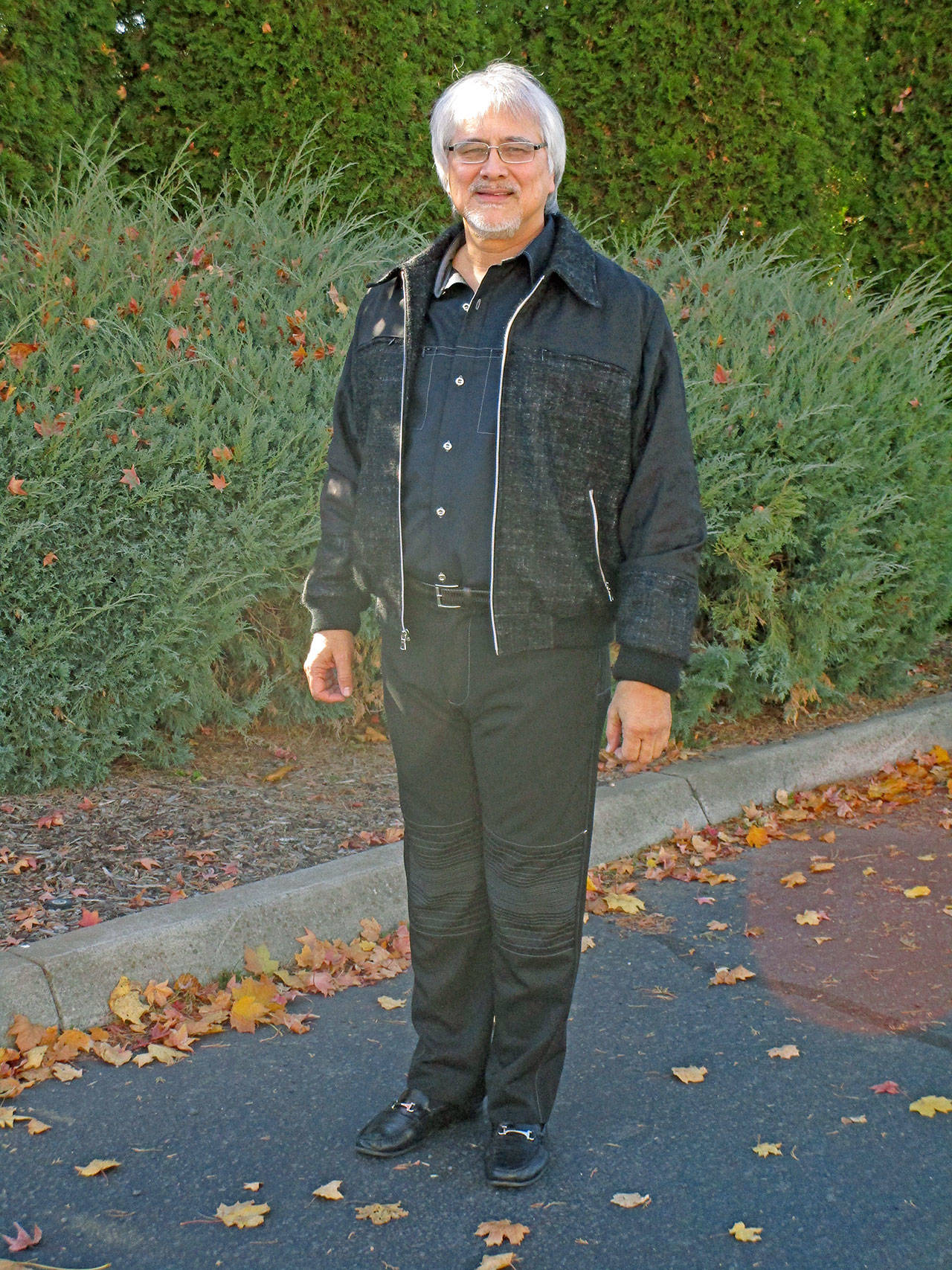 Kents John Yingling fashions his winning three-piece ensemble, consisting of a wool boucle bomber jacket, black wool button down shirt and black wool jeans of his own design. COURTESY PHOTO