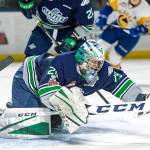 Thunderbirds goalie Matt Berlin reaches to smother the puck during WHL play against Saskatoon on Tuesday night. Berlin made 26 saves in Seattles 4-1 win. COURTESY PHOTO, Brian Liesse, Thunderbirds
