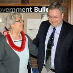 Mayor Suzette Cooke shares a laugh with city Chief Administrative Officer Derek Mathesen during a reception at City Hall on Tuesday. STEVE HUNTER, Kent Reporter