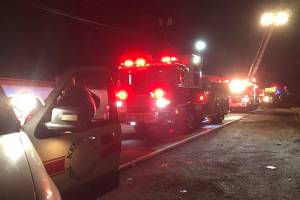 Witness: vehicle driven into Green River; rescuers find man OK along the bank