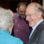 Kent City Attorney Tom Brubaker talks with former Mayor Suzette Cooke at a farewell party for the retiring Brubaker Thursday at City Hall. STEVE HUNTER, Kent Reporter