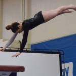 Kentridges Lizzy McKnight competes on the vault during the 4A individual event finals Saturday. RACHEL CIAMPI, Kent Reporter