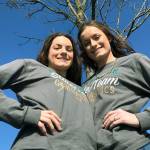 Lizzy, left, and Lexi McKnight helped show the way for Kentridges breakout season in gymnastics. Lexi took the 4A all-around title and Lizzy finished 12th as the Chargers competed as a team in the state finals for the first time in program history. MARK KLAAS, Kent Reporter