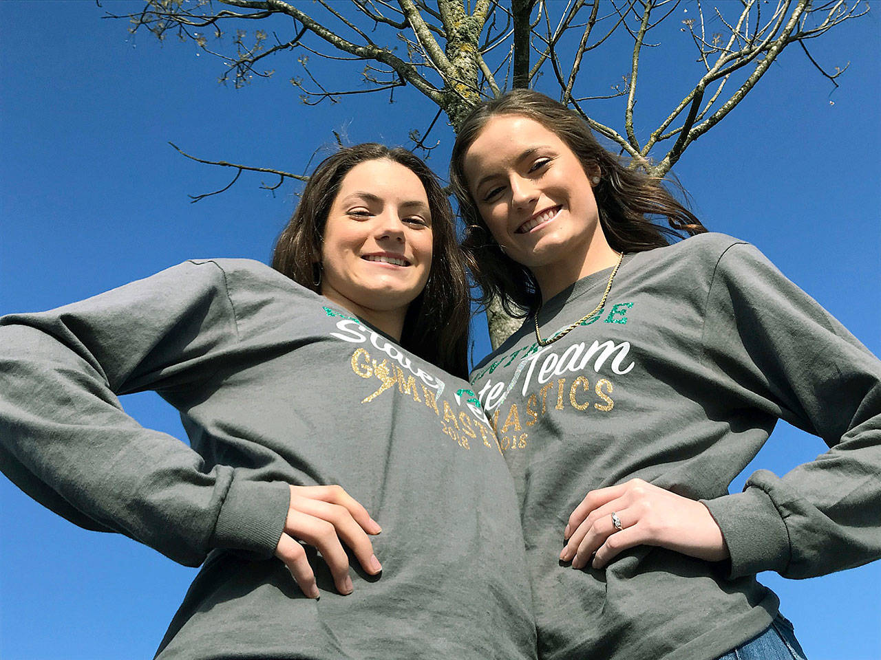 Lizzy, left, and Lexi McKnight helped show the way for Kentridges breakout season in gymnastics. Lexi took the 4A all-around title and Lizzy finished 12th as the Chargers competed as a team in the state finals for the first time in program history. MARK KLAAS, Kent Reporter