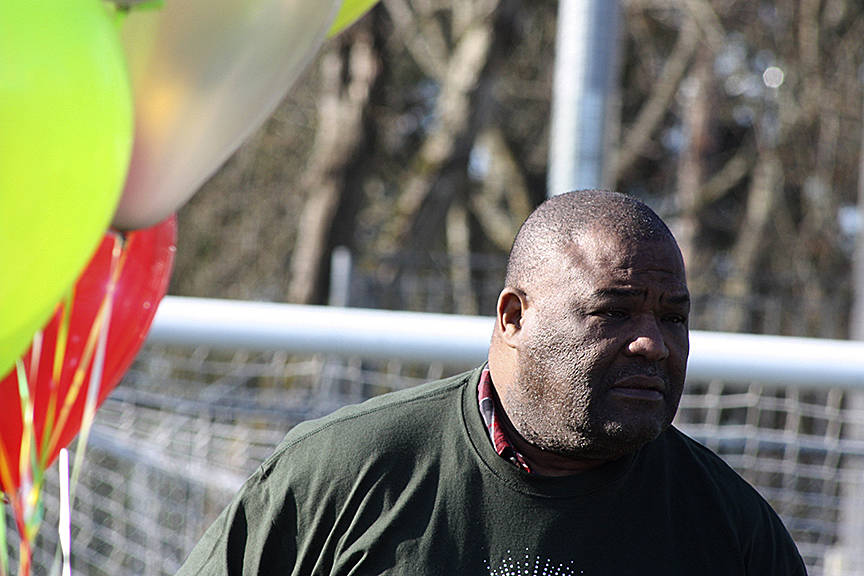 Kent City Council President Bill Boyce listens intently to the field-opening tribute at Hogan Park. MARK KLAAS, Kent Reporter