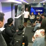 Shannon Augustus, a marketing representative for C-SPAN, engages students on a discussion on the touring bus. MARK KLAAS, Kent Reporter