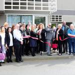 Kent Mayor Dana Ralph and Auburn Mayor Nancy Backus and the Auburn Area and Kent Chambers of Commerce joined company representatives at a ribbon cutting ceremony at the WinnComm facility in Kent on April 19. COURTESY PHOTO