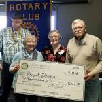 At the presentation are, from left, Rotary Club President Billy Shott; Project Ethiopia spokesperson Lynnda Laurie; Rotarian Kay Cook; and International Committee chair Bob Nachlinger. COURTESY PHOTO
