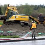 Crews start to prepare the former Riverbend par 3 golf course along West Meeker Street for a 500-unit apartment complex. MARK KLAAS, Kent Reporter