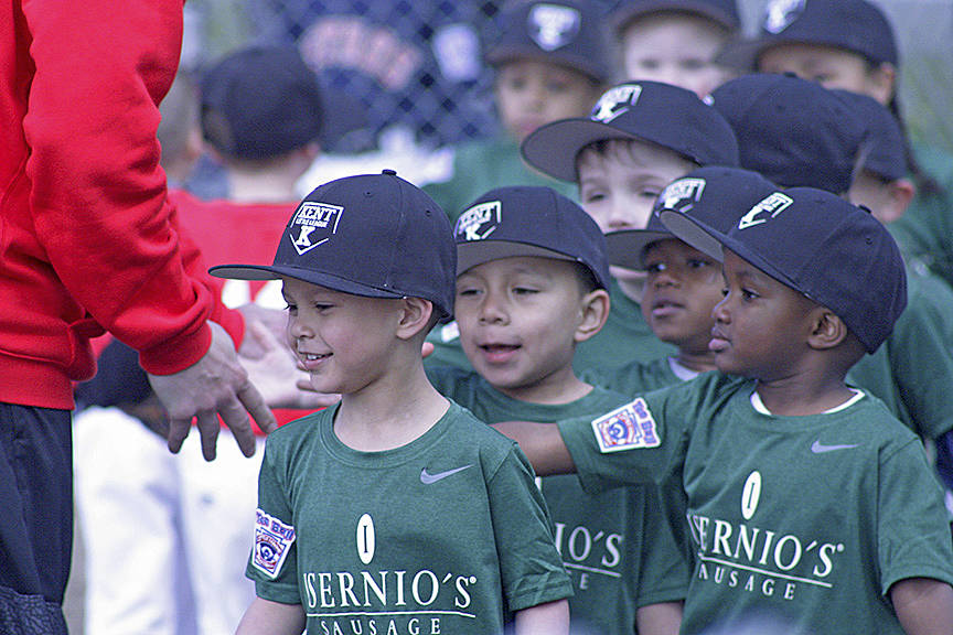 T-ballers shake hands following play. MARK KLAAS, Kent Reporter
