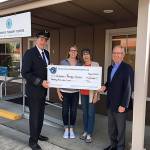 At the ceremony are, from left: Dan Hoffman, president of the Alaska Airlines Pilots Charitable Fund; Laura Anderson, physical therapist at Childrens Therapy Center; Jean Gronewald, friend of CTC; and Barry Gourley, CTC CEO. COURTESY PHOTO