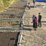 Kent celebrated the grand opening of a community garden in Kent on Wednesday, May 9. Volunteers with World Relief and the Hillside Church kicked off the spring growing season with tours of the Paradise Parking Plots Community Garden, which earned a $75,000 grant through King Countys WaterWorks Grant Program to control polluted runoff through the inventive use of green stormwater infrastructure. MARK KLAAS, Kent Reporter