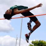 Kentridges Tyler Cronk sails over the bar during the high jump finals at the 4A state track and field championships at Tacomas Mount Tahoma High School last Saturday. Cronk, a 6-foot-8 senior, cleared 6 feet, 9 inches, to capture his second straight title. RACHEL CIAMPI, Reporter