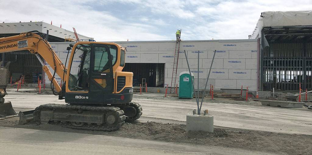 The new passenger terminal at Paine Field. The ticketing and check-in area will be on the right, and baggage claim will be on the left. (Janice Podsada / The Herald)
