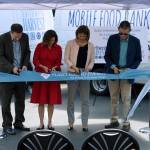 From Left: Thomas Reynolds, Northwest Harvest CEO; Kimberly Harris, Puget Sound Energy President and CEO; state Rep. Mia Gregerson, D-SeaTac; and state Sen. John McCoy, D-Tulalip, participate in a ribbon cutting ceremony at the Kent facility on June 5. COURTESY PHOTO
