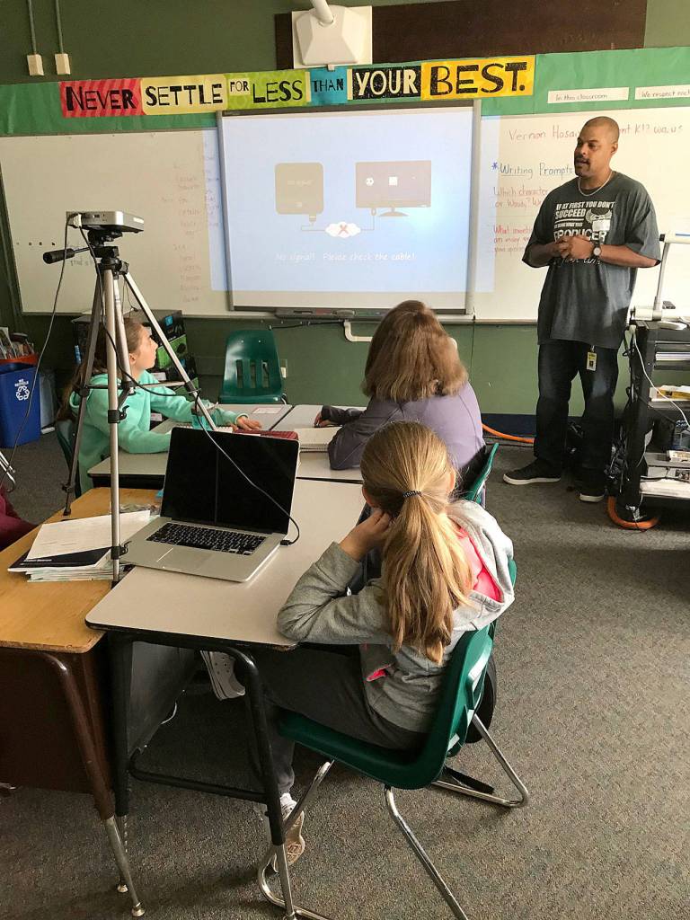 Brandon Greenwood, who produces movies, reality TV shows and videos, talks to students. MARK KLAAS, Kent Reporter