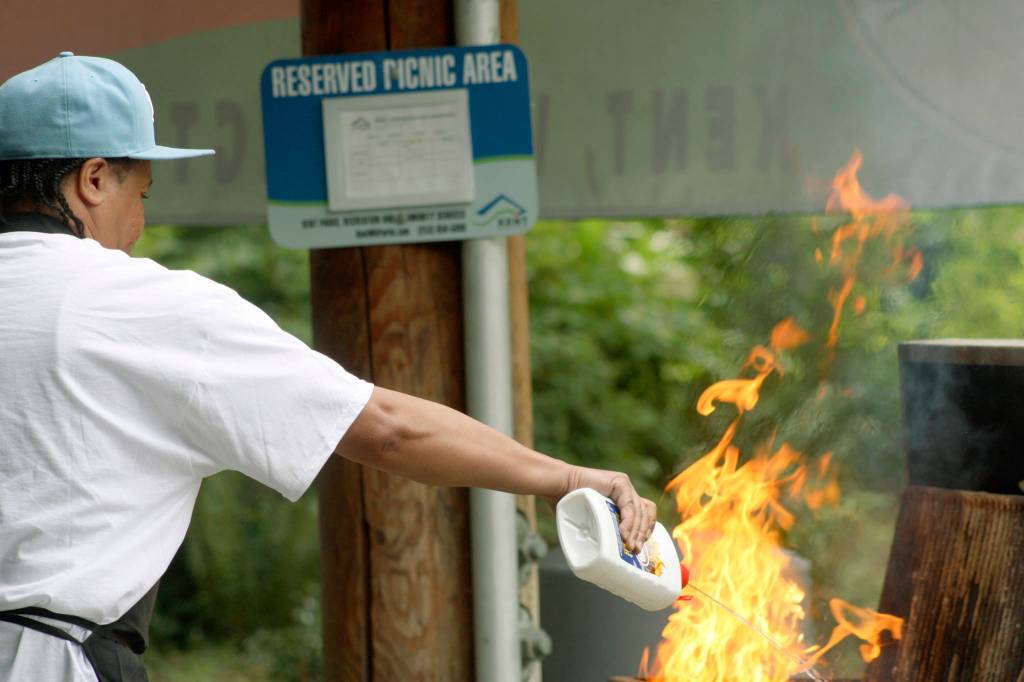 Heats on: Festival-goers were treated to a barbecue at Morrill Meadows Park. MARK KLAAS, Kent Reporter