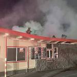 Firefighters attack a blaze early Thursday morning at Country Burger and Teriyaki, 1605 W. Meeker St. COURTESY PHOTO, Puget Sound RFA