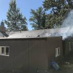 Fire damages a home Thursday in the 25300 block of 30th Avenue South on the West Hill. COURTESY PHOTO, Puget Sound RFA
