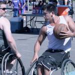 Nick Weiss of the Mystic Ballers confronts the BBB defense in wheelchair division play. MARK KLAAS, Kent Reporter