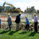City leaders, including Kent Mayor Dana Ralph, third from left, and Kent City Council President Bill Boyce, join the YMCA groundbreaking ceremony at Morrill Meadows Park last Saturday. After Boyce, in the dirt-turning photo, from left, are Katie OSullivan, board chair for the YMCA of Greater Seattle; Kevin Hasslinger, board chair of the Kent YMCA; and Bob Gilbertson, YMCA of Greater Seattle president. MARK KLAAS, Kent Reporter
