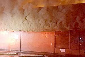 Fire damages Kent pawn shop, vehicles