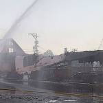 Firefighters battle a blaze early Wednesday at a pawn shop in the 100 block of Central Avenue North. COURTESY PHOTO, Puget Sound Fire