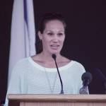 Shelly Moreno talks about her husband, Kent Police Officer Diego Moreno, at a community vigil in Town Square Plaza on Wednesday night. Diego Moreno was killed in the line of duty Sunday. MARK KLAAS, Kent Reporter