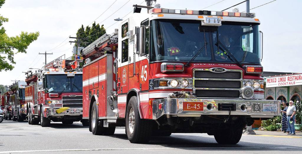 Fire departments join the procession. RACHEL CIAMPI, Reporter