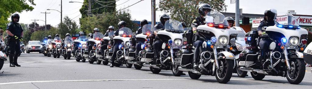 Motorcycle patrol officers participate in the procession. RACHEL CIAMPI, Reporter