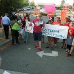 Larry Delaney, a Washington Education Association board director, urges Kent teachers to continue the fight for better pay. MARK KLAAS, Kent Reporter