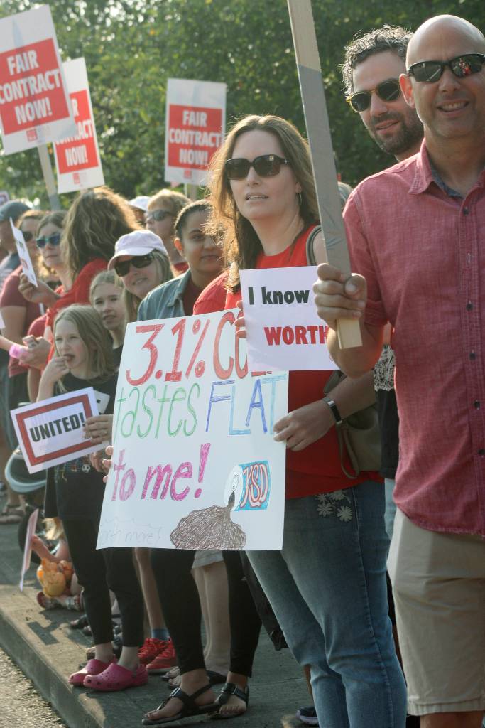 Teachers, parents and families rally. MARK KLAAS, Kent Reporter