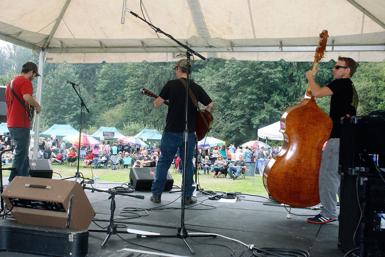 The Cottonwood Cutups play a bluegrass number as the crowd assembles during last years Hops & Crops Music and Beer Festival at Mary Olson Farm. The band returns for the ninth annual festival on Sept. 15. MARK KLAAS, Auburn Reporter