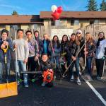 Milanni Matautia and her friends at a volunteer effort. COURTESY PHOTO