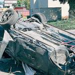 Driver rolls car along Pacific Highway South on Kent’s West Hill