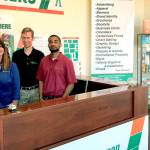 Meet the team of Minuteman Press in Kent, from left: Dawn Brown; Jeff Brown, Micah and Zach. COURTESY PHOTO