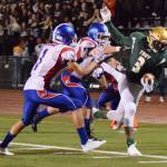 Auburns Josiah Fagan runs for a big gain before being knocked out of bounds during NPSL play Friday night. RACHEL CIAMPI, Auburn Reporter