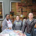 Camico Rivon, assistant director of Kent Food Bank, Jeniece Choate, executive director of Kent Food Bank, Torklift Central owner Jack Kay and Torklift Central employee Kerstin Stokes look on as goods are delivered in 2017 for Thanksgiving to the Kent Food Bank. COURTESY PHOTO, Torklift Central