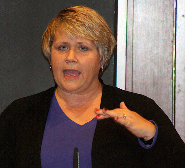 Kent Mayor Dana Ralph delivers her budget speech Tuesday to the City Council at City Hall. STEVE HUNTER, Kent Reporter