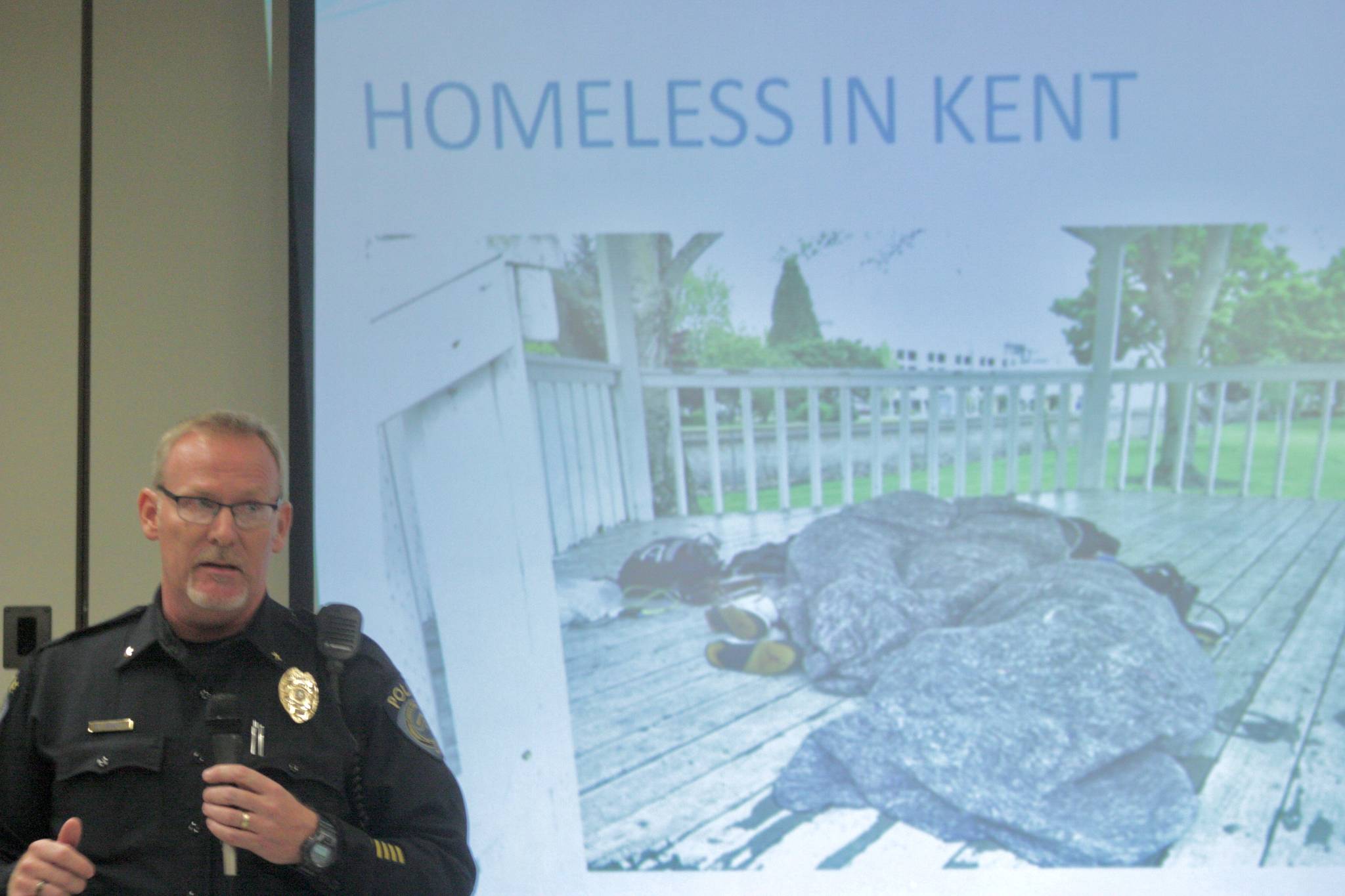 Kent Police Commander Mike OReilly, who oversees a special operation unit focused on the homeless, describe the departments latest efforts in addressing the crisis during a public meeting Oct. 18 at Neely-OBrien Elementary School. MARK KLAAS, Kent Reporter