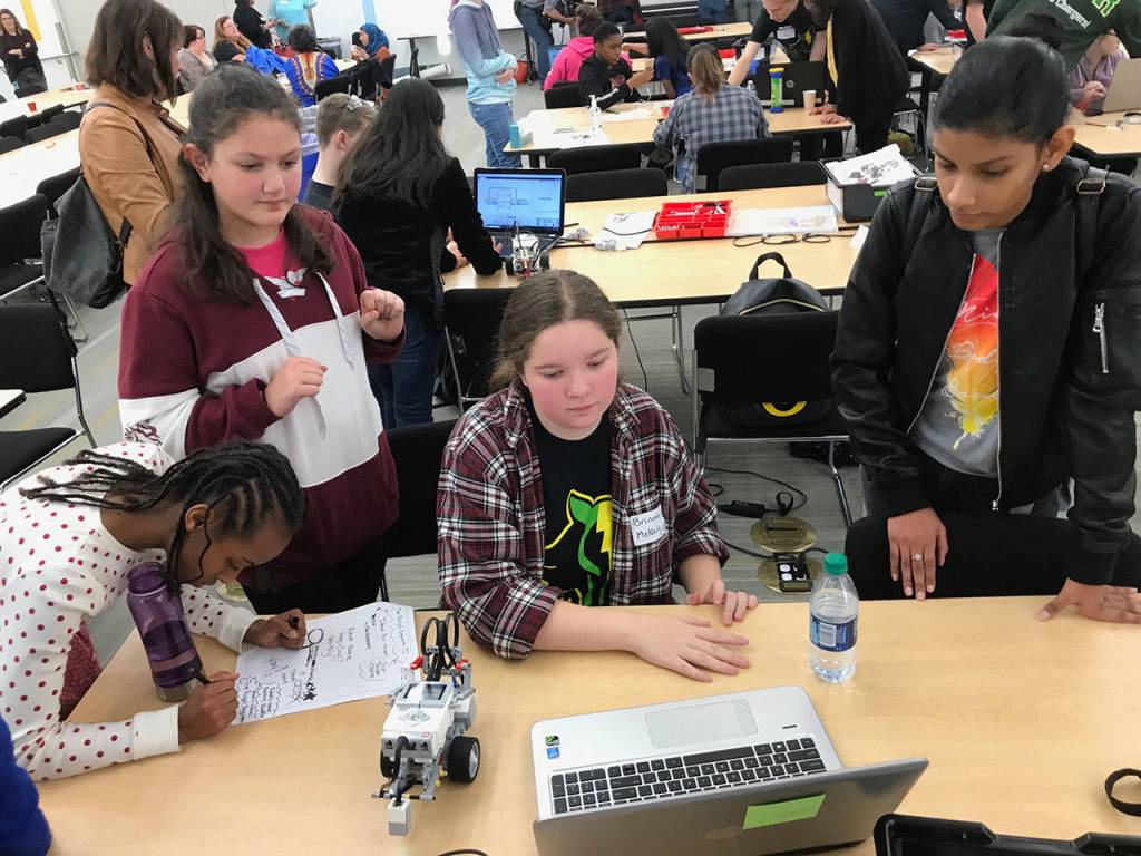 Eighty Mill Creek and Mattson middle school girls came to Amazons Kent Fulfillment Center on Tuesday to build and test robots. MARK KLAAS, Kent Reporter