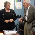 Kent Mayor Dana Ralph, left, discusses with Dale Brantner, of Kent Seniors United, ways to work with state legislators to reduce property taxes for seniors. STEVE HUNTER, Kent Reporter