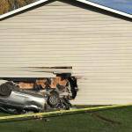 The driver of the sedan and two people in the townhouse were not hurt in the crash Sunday. COURTESY PHOTO, Puget Sound RFA