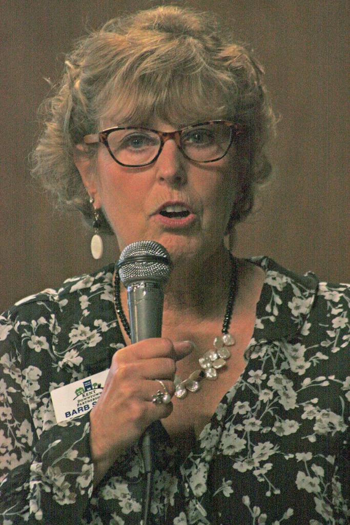 Barbara Smith, KDP executive director, praises the work of businesses and people in the downtown district. MARK KLAAS, Kent Reporter